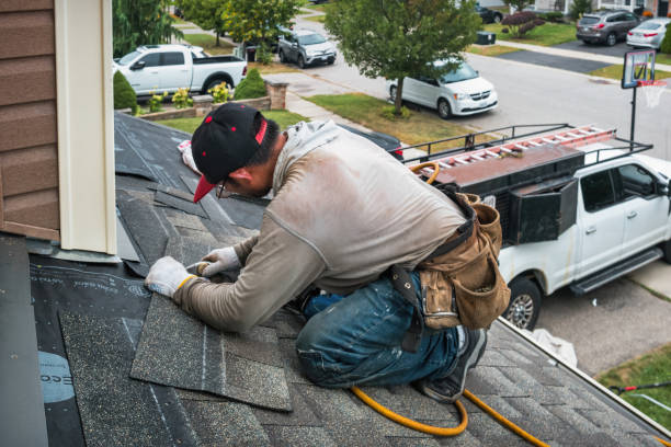 Professional Roofing technician working in Ivor, VA
